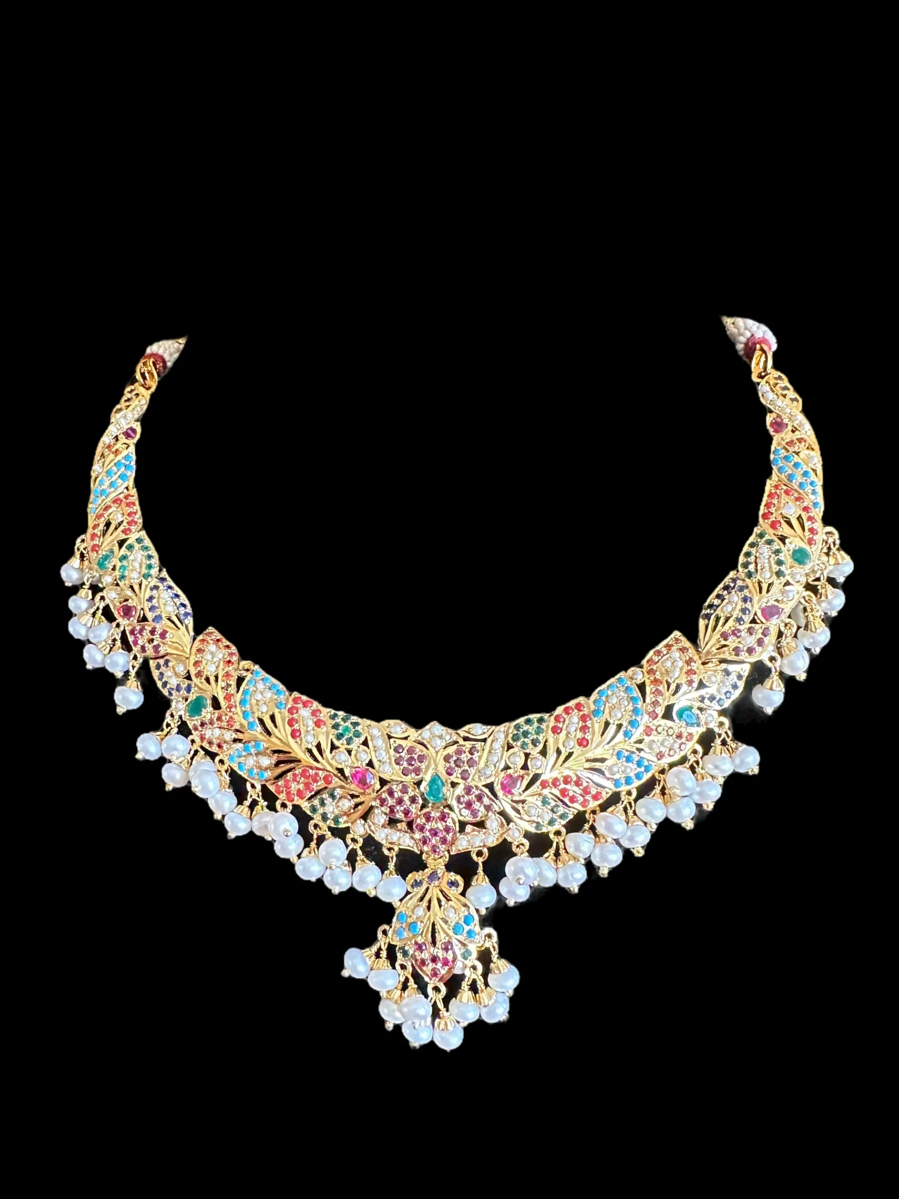 Navratan necklace  set with fresh water pearls in gold plated silver