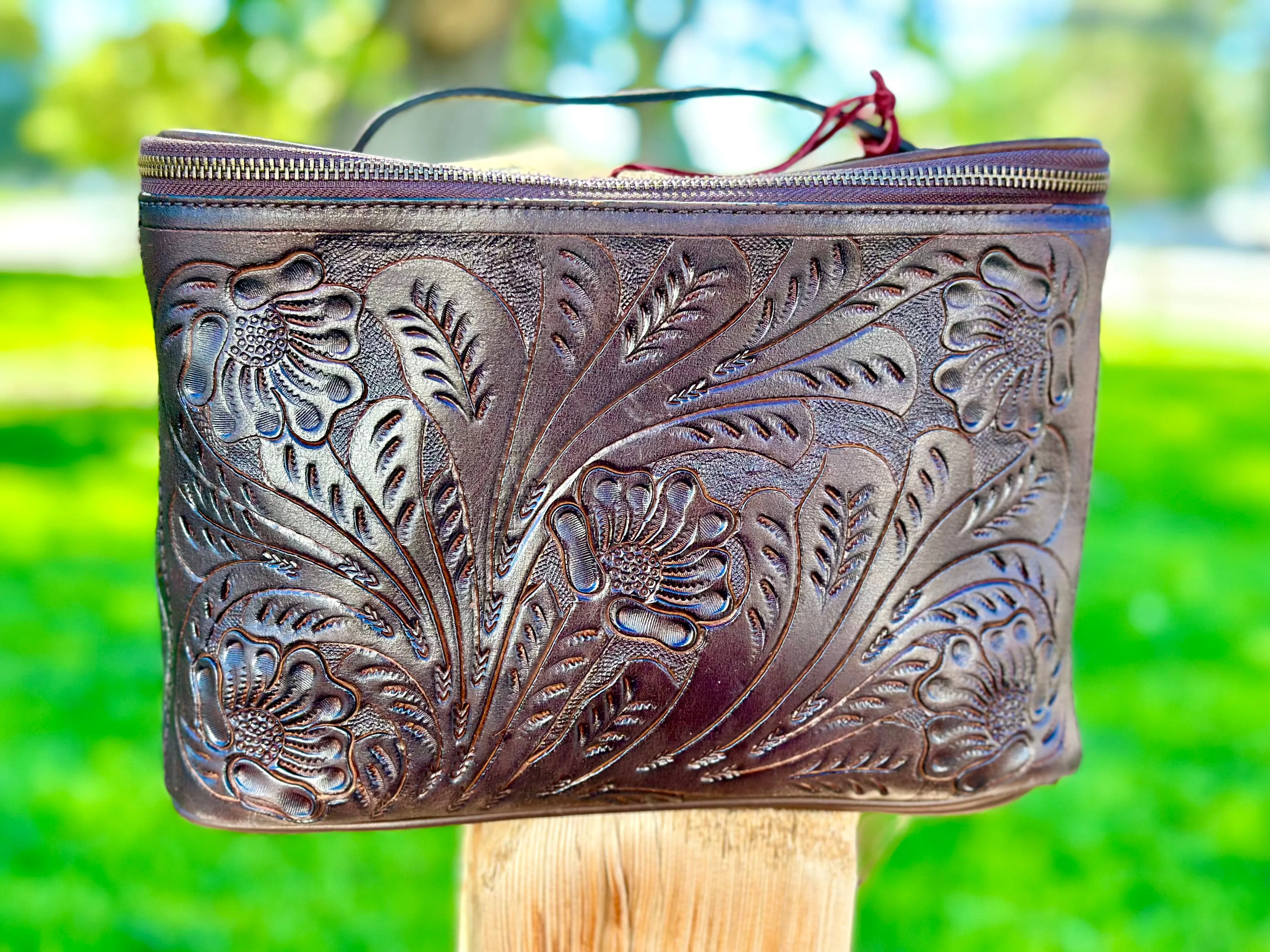 The STS Westward Ho Tooled Leather Makeup Train Case